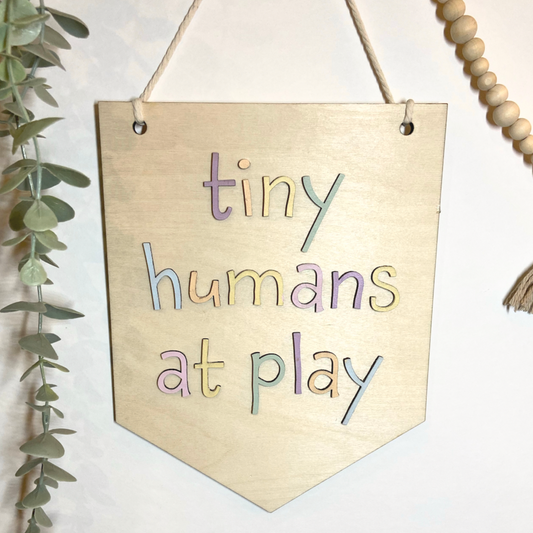 Tiny humans at play | Wall hanging